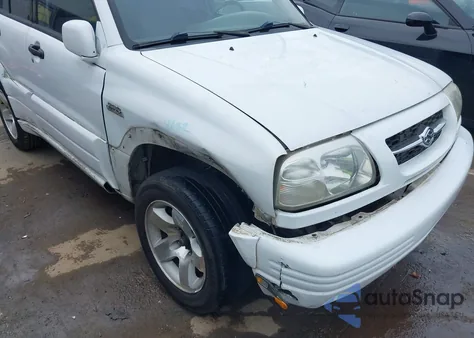 1999 Suzuki Grand Vitara Jlx/Jlx+ from USA, damaged, VIN JS3TD62VXX4120292